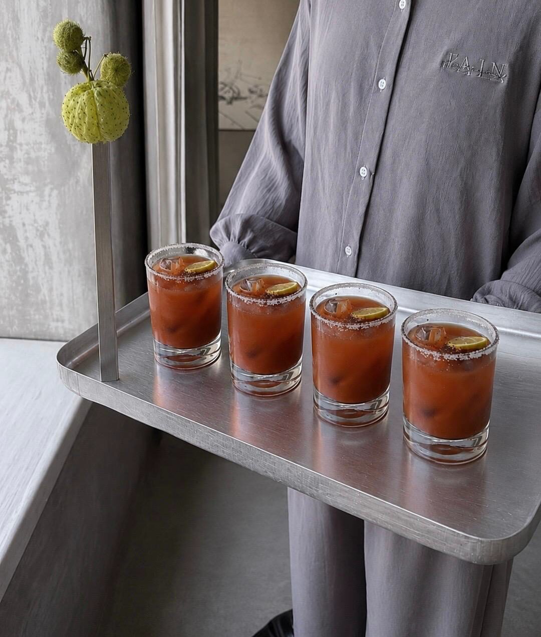 drinks carried on a steel tray