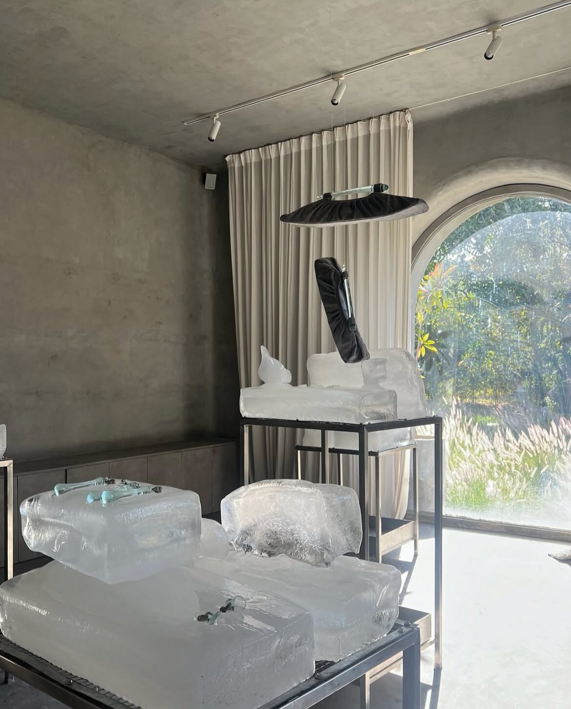 objects set in blocks of ice in the studio