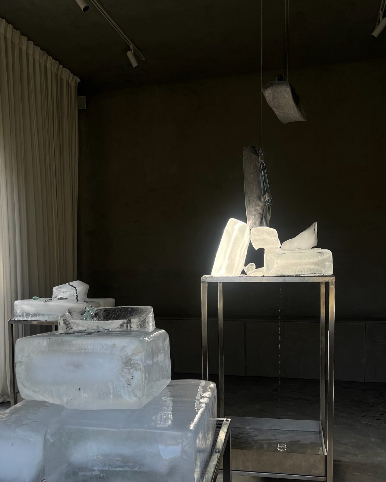 ice and objects lit in the dark studio