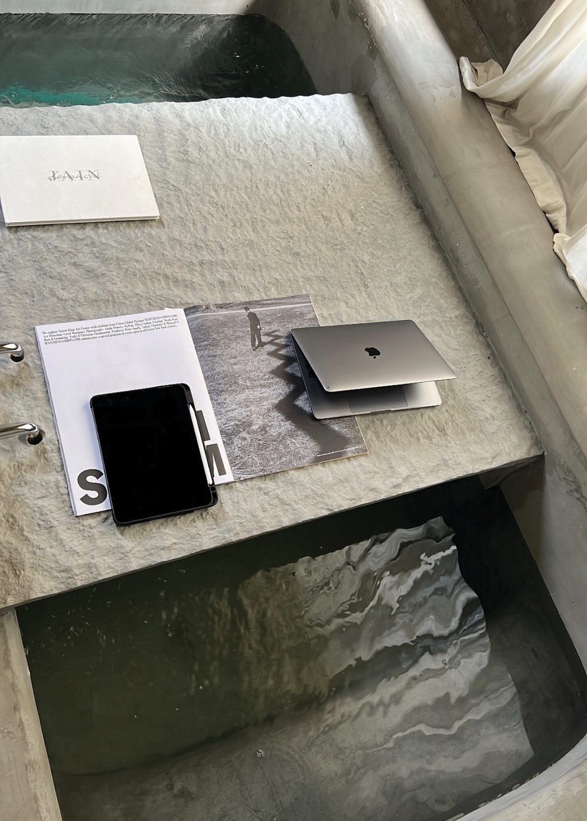 a concrete desk over water