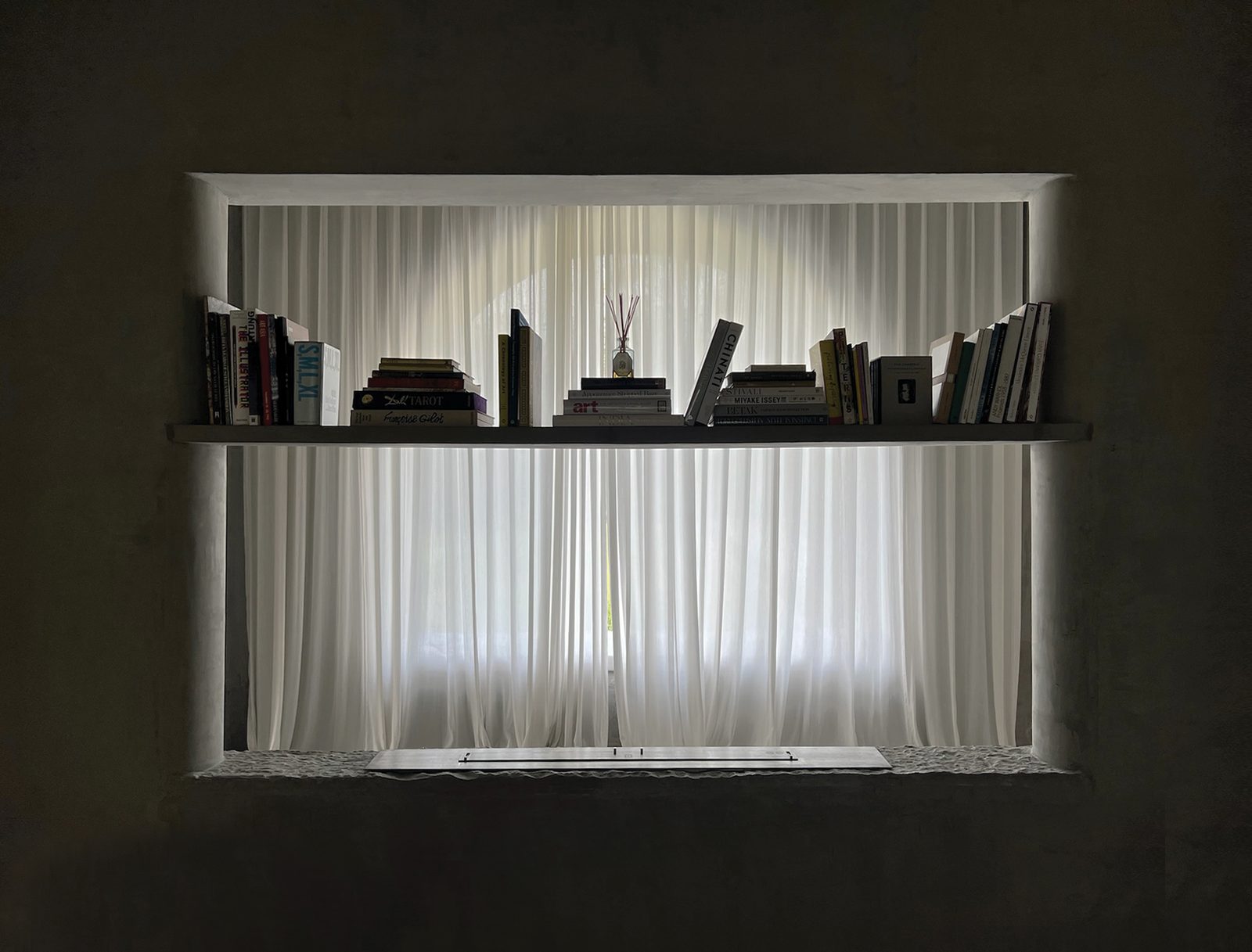 the reading niche, lit from behind