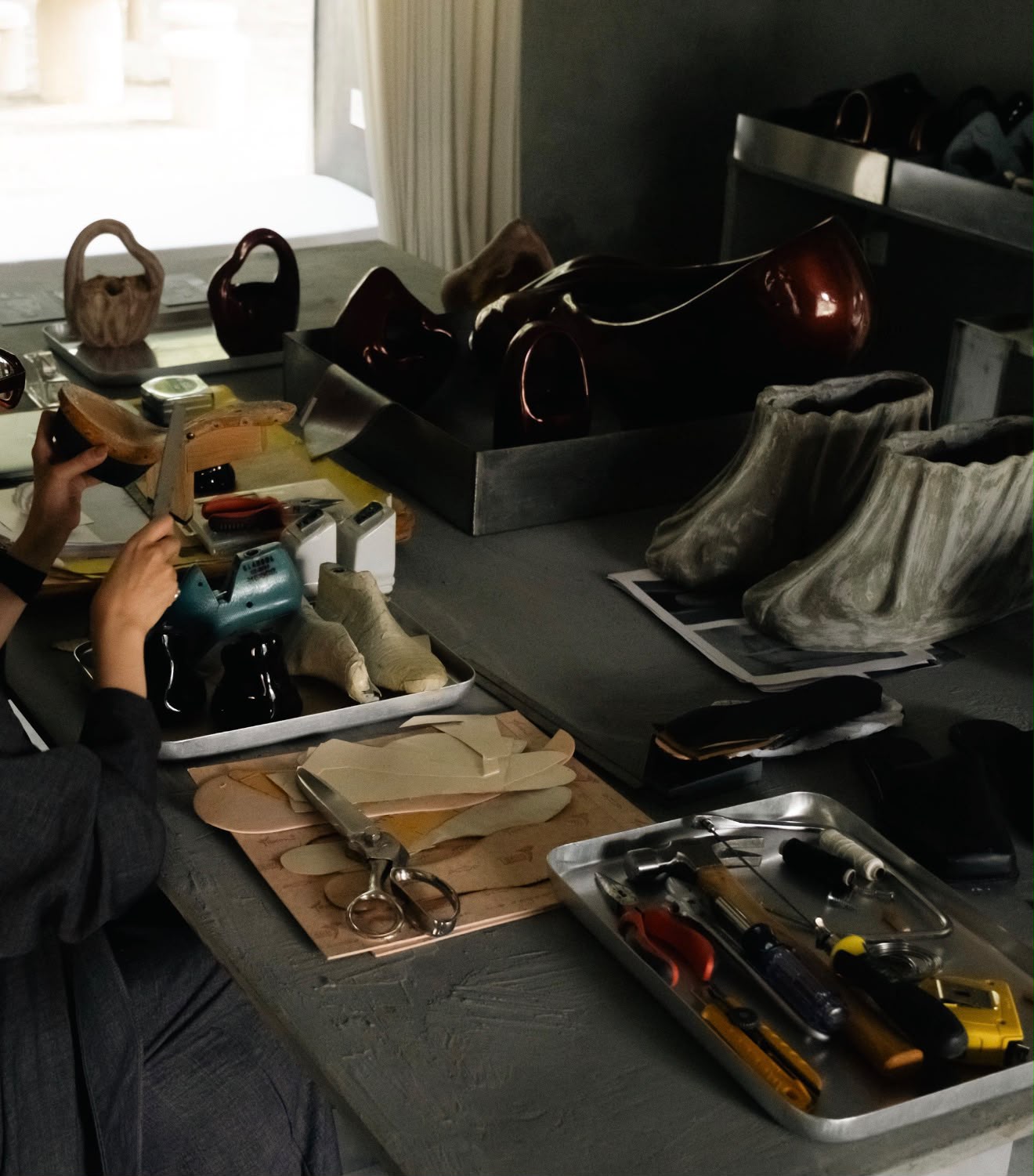 the workbench: lasts, patterns, tools and shoes in progress